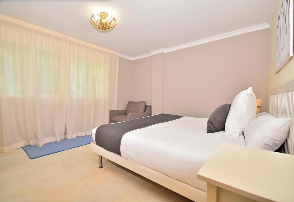 Aparthotel Ola Blanca Cala de Finestrat Quarto foto
